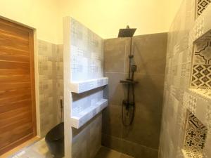a bathroom with a shower and a toilet in it at S&S House 2 in Koh Phangan +15 photos
