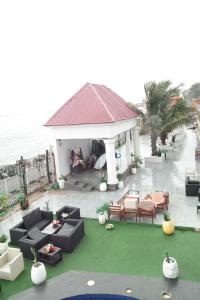 an aerial view of a house with a patio at NEW VIEW BEACH HOTEL AND RESORT in Lagos