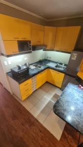 Kuchyň nebo kuchyňský kout v ubytování Cabañas Habitainer BordeRio