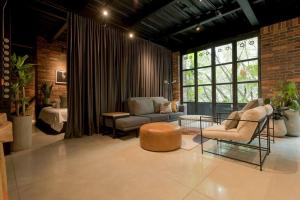 Posezení v ubytování Hotel Meridiano Lofts