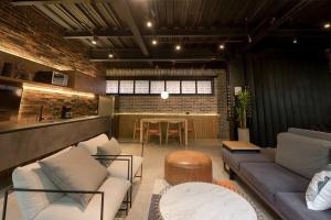 Posezení v ubytování Hotel Meridiano Lofts