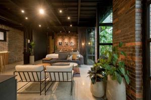 Posezení v ubytování Hotel Meridiano Lofts