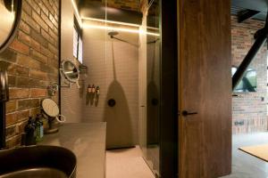 Koupelna v ubytování Hotel Meridiano Lofts