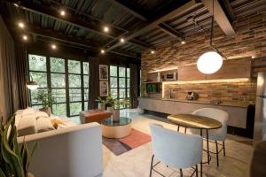 Posezení v ubytování Hotel Meridiano Lofts