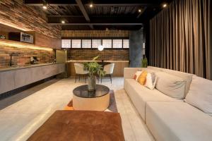 Posezení v ubytování Hotel Meridiano Lofts