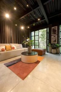 Posezení v ubytování Hotel Meridiano Lofts