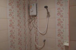 Koupelna v ubytování Review Resort