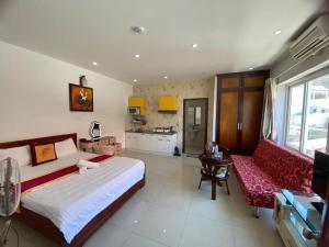Postel nebo postele na pokoji v ubytování Đức Anh HoTel Vũng Tàu