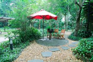 Vườn quanh Villa Owner tại khu nghỉ dưỡng sinh thái Đại Lải Resort