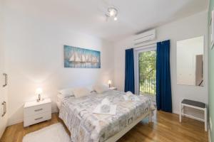 Ένα ή περισσότερα κρεβάτια σε δωμάτιο στο Villa Ana +26 φωτογραφίες