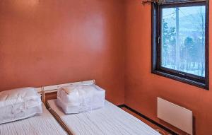 Ένα ή περισσότερα κρεβάτια σε δωμάτιο στο Amazing Home In Leines With House Sea View