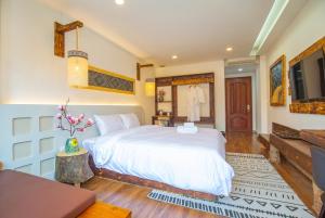 Mimosa Homestay Hanoi房間的床