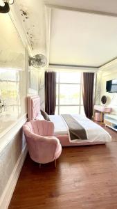 Postel nebo postele na pokoji v ubytování BÔNG SEN HOTEL CÔN ĐẢO + 19 fotografií