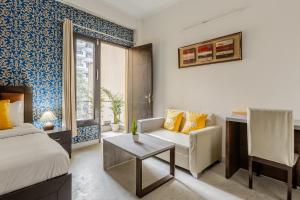 Postel nebo postele na pokoji v ubytování Lime Tree Hotel - Golf Course Road, Sector-43, Gurugram