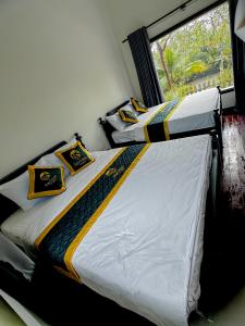 Кровать или кровати в номере Rạch sao eco garden