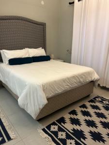 Ένα ή περισσότερα κρεβάτια σε δωμάτιο στο SOMS Langstrand Self Catering +15 φωτογραφίες