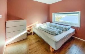 A bed or beds in a room at Beautiful Home In Lindesnes With Wi-fi