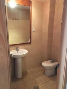 a bathroom with a sink and a toilet at 3 bedrooms house with wifi at Cartagena in Cartagena