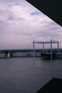 a pavilion on the roof of a building at Fantastic view in Piteşti