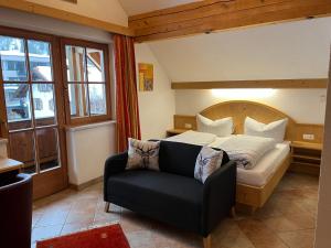 Łóżko lub łóżka w pokoju w obiekcie Hotel Garni Gafluna