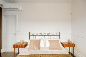 Säng eller sängar i ett rum på Scaramantico Apartment
