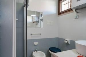 Koupelna v ubytování Moretto 10 - con piscina e WiFi