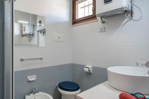 Koupelna v ubytování Moretto 10 - con piscina e WiFi