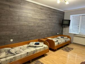 Ένα ή περισσότερα κρεβάτια σε δωμάτιο στο Boguslavl'