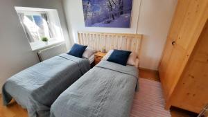 Rúm í herbergi á Apartmán Franz Josef