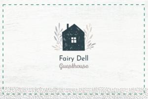 una tarjeta con una casa negra en un fondo blanco en fAiRy Dell Guesthouse with cozy lockable rooms, tv, free tea tray, free wifi, free parking, en Oakenshaw