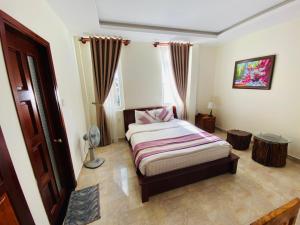 Voodi või voodid majutusasutuse Hoang Quan Hotel toas