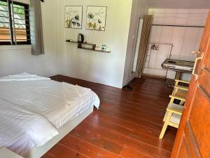 Ein Bett oder Betten in einem Zimmer der Unterkunft Koh RhongSunshine Resort