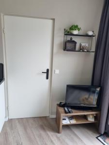 TV a/nebo společenská místnost v ubytování Studio Donna
