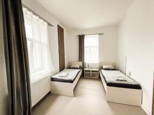 Posteľ alebo postele v izbe v ubytovaní Apartmány Plzeň Zábělá 69