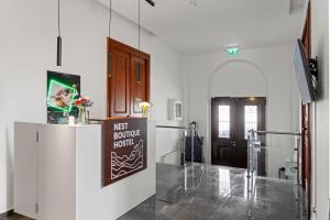 The lobby or reception area at Nest Boutique Hostel