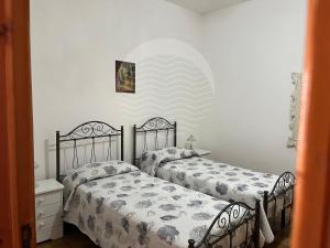 Villetta Zora - Spiaggia a 250m tesisinde bir odada yatak veya yataklar
