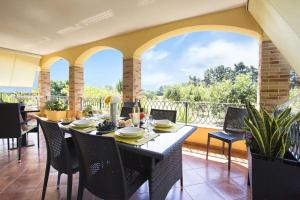 Balkón alebo terasa v ubytovaní Alghero Villa Mistral per 7 persone Terrazza BBQ AC WiFi