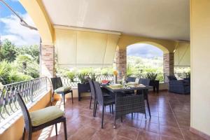 Balkón alebo terasa v ubytovaní Alghero Villa Mistral per 7 persone Terrazza BBQ AC WiFi