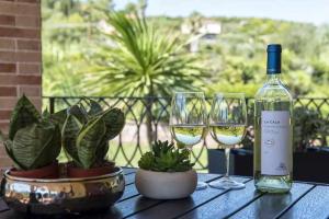 Nápoje v ubytovaní Alghero Villa Mistral per 7 persone Terrazza BBQ AC WiFi