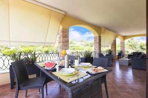 Posedenie v ubytovaní Alghero Villa Mistral per 7 persone Terrazza BBQ AC WiFi