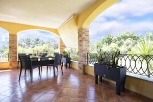 Balkón alebo terasa v ubytovaní Alghero Villa Mistral per 7 persone Terrazza BBQ AC WiFi