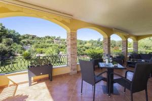 Balkón alebo terasa v ubytovaní Alghero Villa Mistral per 7 persone Terrazza BBQ AC WiFi