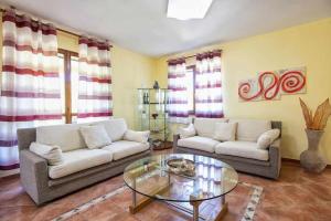 Posedenie v ubytovaní Alghero Villa Mistral per 7 persone Terrazza BBQ AC WiFi