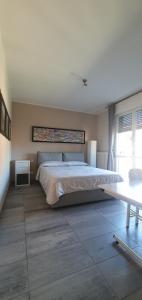 Letto o letti in una camera di CASA VACANZE Matilde