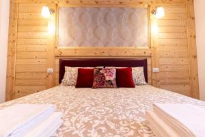 Posteľ alebo postele v izbe v ubytovaní Ledro Lake Suite "Pur"