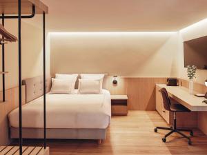 Swissôtel Kursaal Bern房間的床
