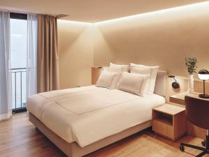 Swissôtel Kursaal Bern房間的床
