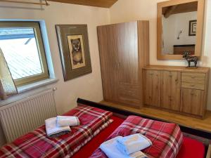 Posteľ alebo postele v izbe v ubytovaní Gasthof Rafting Alm