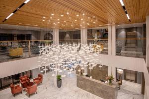 a large conference room with a large table in a building at Hyatt Place Goa Candolim in Candolim