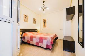 A bed or beds in a room at ALEGRIA ID103